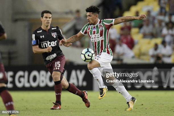 Richard of Fluminense battles for the ball with Hernanes of Sao Paulo during the match between Fluminense and Sao Paulo as part of Brasileirao Series...