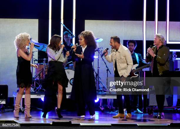 Singer-songwriter Kimberly Schlapman and Karen Fairchild of Little Big Town, Andra Day, Jimi Westbrook and Philip Sweet of Little Big Town perform...