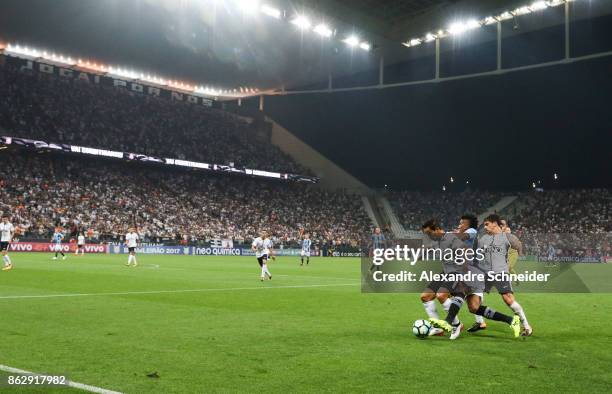 Jadson of Corinthians, Cortez of Gremio and Fagner of Corinthians in action during the match between Corinthians v Gremio for the Brasileirao Series...