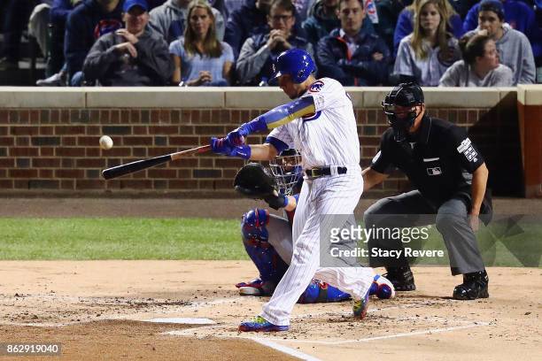 Willson Contreras of the Chicago Cubs hits a home run in the second inning against the Los Angeles Dodgers during game four of the National League...