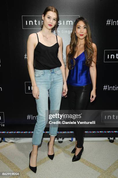 Anais Pouliot and a guest attend the Intimissimi Grand Opening on October 18, 2017 in New York, United States.