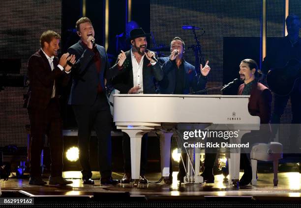 Brian Littrell, Nick Carter, AJ McLean, Howie Dorough, and Kevin Richardson of the Backstreet Boys perform onstage at the 2017 CMT Artists Of The...