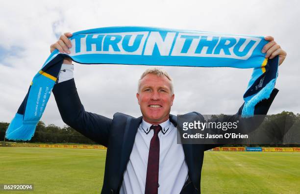 Garth Brennan poses for a photo after being announced as the new Gold Coast Titans NRL coach at Titans Centre of Excellence on October 19, 2017 in...