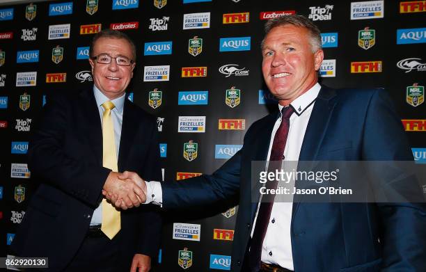 Garth Brennan shakes hands with CEO Graham Annesley after being announced as the new Gold Coast Titans NRL coach at Titans Centre of Excellence on...