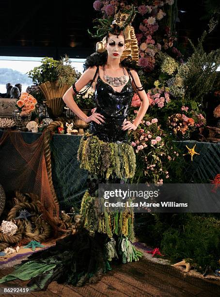 Model showcases designs by Romance Was Born on the catwalk off-site at The Wharf Restaurant at the Sydney Theatre Company on day four of Rosemount...