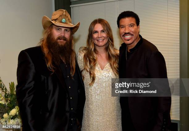 Chris Stapleton, Morgane Stapleton, and Lionel Richie attend the 2017 CMT Artists Of The Year on October 18, 2017 in Nashville, Tennessee.