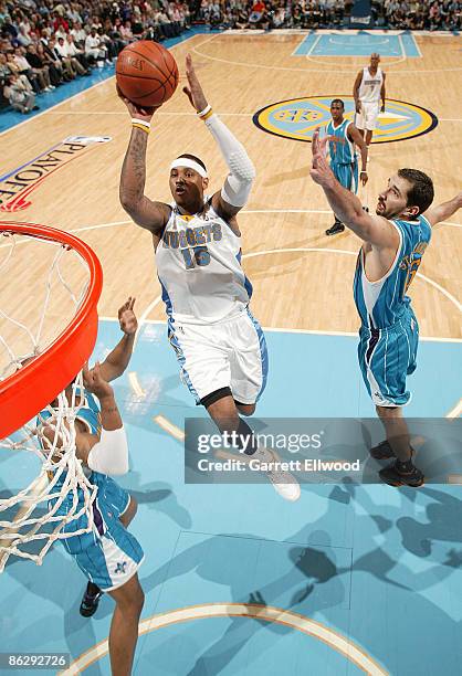 Carmelo Anthony of the Denver Nuggets goes to the basket against the New Orleans Hornets during Game Five of the Western Conference Quarterfinals...