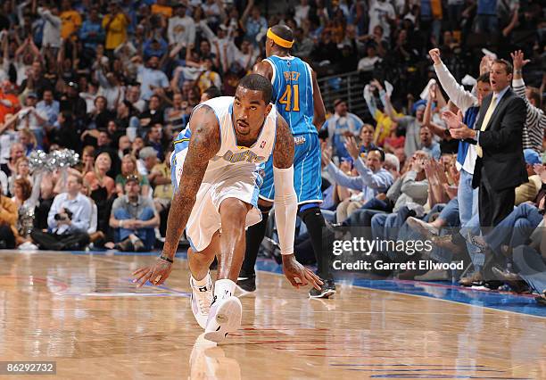 Smith of the Denver Nuggets celebrates after a shot against the New Orleans Hornets during Game Five of the Western Conference Quarterfinals during...