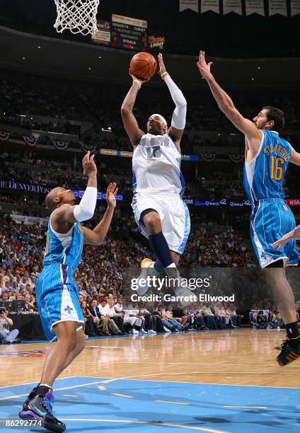 Carmelo Anthony of the Denver Nuggets goes to the basket against the New Orleans Hornets during Game Five of the Western Conference Quarterfinals...