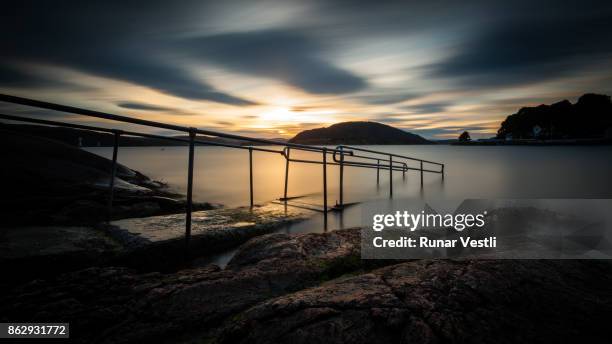 a wheelchair ramp at sunset - wheelchair ramp stock pictures, royalty-free photos & images