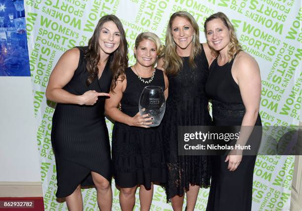 The 2017 United States Womens National Hockey Team receive the Wilma Rudolph Courage Award; Hilary Knight, Meghan Duggan, presenter Angela Ruggiero...