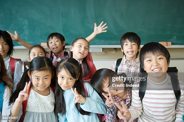 portrait of japanese children in classroom - children only stock pictures, royalty-free photos & images