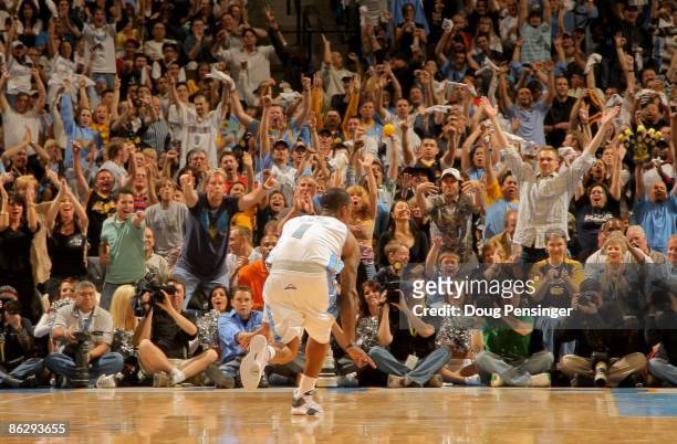 Smith of the Denver Nuggets celebrates a three point goal against the New Orleans Hornets to the delight of the crowd in Game Five of the Western...