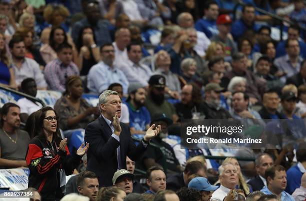 Tony Ressler, owner of the Atlanta Hawks and Jami Gertz cheer during a game against the Dallas Mavericks at American Airlines Center on October 18,...