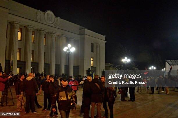 Activists block the street and set up tents, during their protest 'Big political reform' in front of the Ukrainian Parliament.