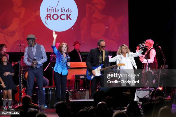 Keb' Mo', Bonnie Raitt, Elvis Costello, and Darlene Love perform onstage during the Little Kids Rock Benefit 2017 at PlayStation Theater on October...