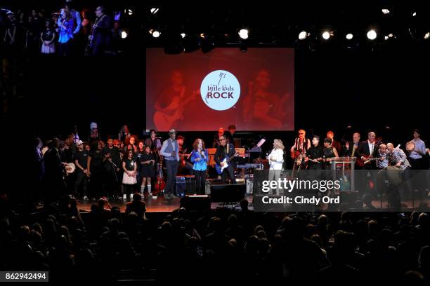 Keb' Mo', Bonnie Raitt, Elvis Costello, and Darlene Love perform onstage during the Little Kids Rock Benefit 2017 at PlayStation Theater on October...