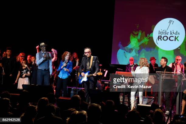 Keb' Mo', Bonnie Raitt, Elvis Costello and Darlene Love perform onstage during the Little Kids Rock Benefit 2017 at PlayStation Theater on October...