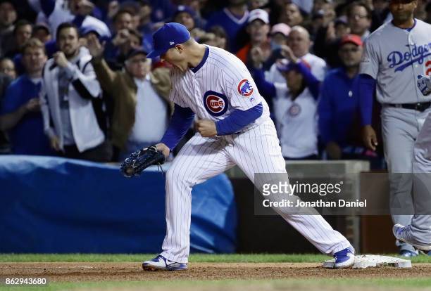 Anthony Rizzo of the Chicago Cubs celebrates defeating the Los Angeles Dodgers 3-2 in game four of the National League Championship Series at Wrigley...