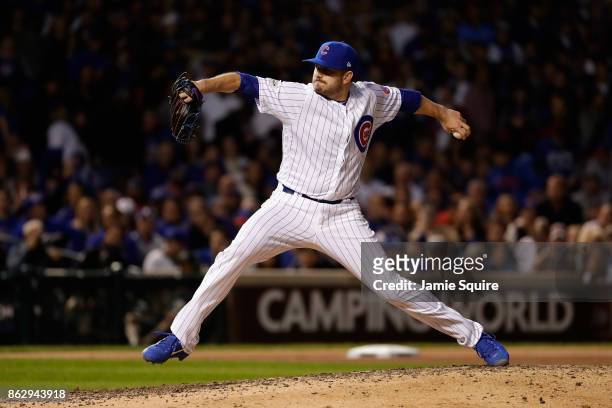Brian Duensing of the Chicago Cubs pitches in the seventh inning against the Los Angeles Dodgers during game four of the National League Championship...