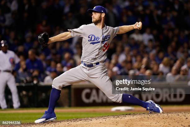 Tony Cingrani of the Los Angeles Dodgers pitches in the eighth inning against the Chicago Cubs during game four of the National League Championship...