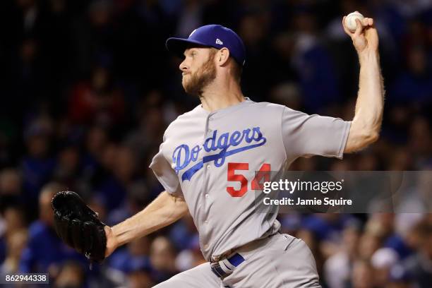 Tony Cingrani of the Los Angeles Dodgers pitches in the eighth inning against the Chicago Cubs during game four of the National League Championship...