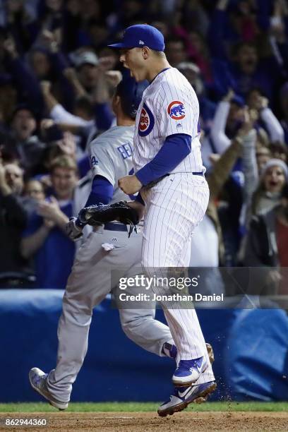 Anthony Rizzo of the Chicago Cubs celebrates defeating the Los Angeles Dodgers 3-2 in game four of the National League Championship Series at Wrigley...