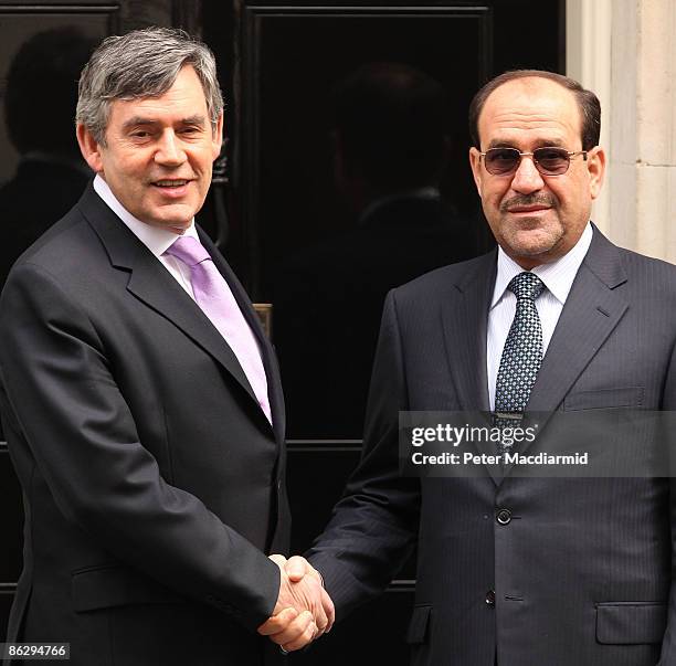 Prime Minister Gordon Brown stands with Iraqi Prime Minister Nouri Nouri Al-Maliki outside Number 10 Downing Street on April 30, 2009 in London. Mr...