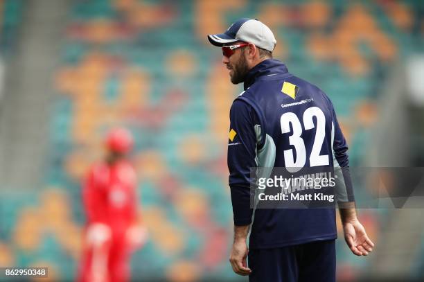 Glenn Maxwell of the Bushrangers looks on as he fields during the JLT One Day Cup match between South Australia and Victoria at Blundstone Arena on...