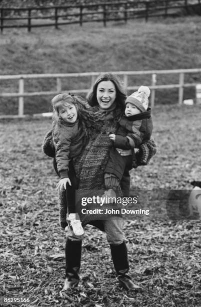 English actress Jane Seymour with her children Katie and Sean, 7th January 1987.