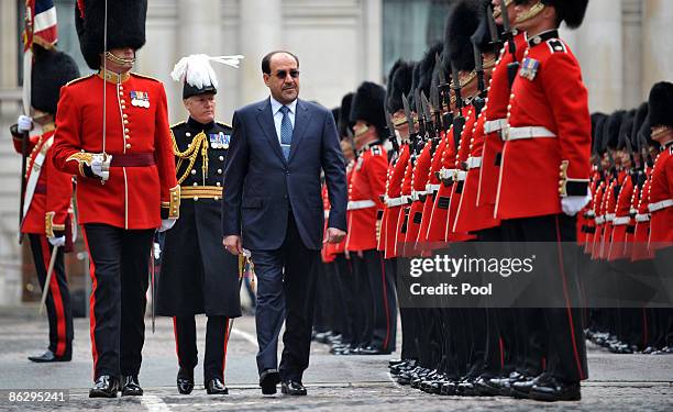 Iraqi Prime Minister Nouri al-Maliki attends a Guard of Honour ceremony in his honour held in the quadrangle at the Foreign Office on April 30, 2009...