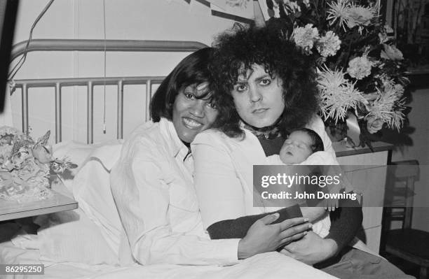 English glam rock star Marc Bolan with his girlfriend, American singer Gloria Jones, and their son Rolan Bolan, 2nd October 1975.