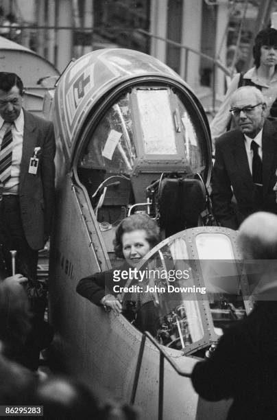British Prime Minister Margaret Thatcher inspects a Sea Harrier aircraft, during a visit to the British Aerospace factory at Dunsfold, Surrey, 18th...