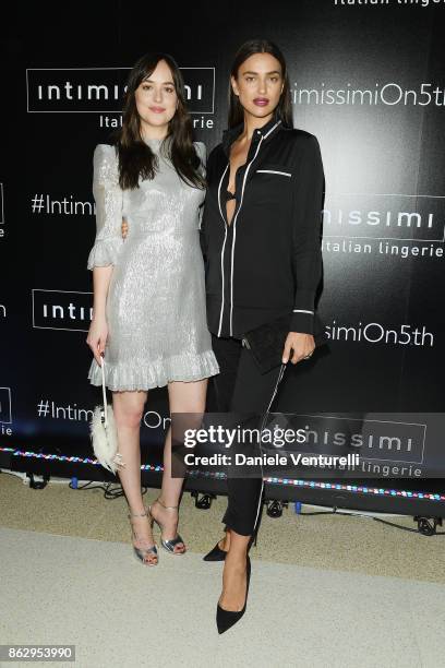 Dakota Johnson and Irina Shayk attends the Intimissimi Grand Opening on October 18, 2017 in New York, United States.