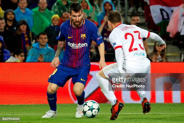 Leo Messi and Leonardo Koutris during Champions League match between FC Barcelona v Olympiakos FC , in Barcelona, on October 18, 2017.