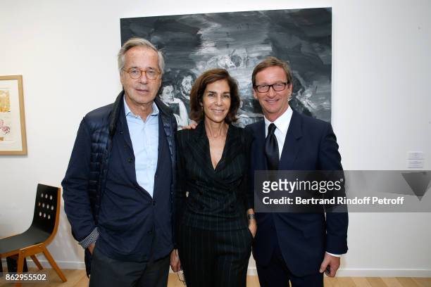 Olivier Orban, his wife Christine and Thaddaeus Ropac attend the FIAC 2017 - International Contemporary Art Fair : Press Preview at Le Grand Palais...