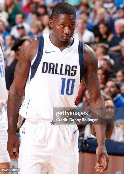 Dorian Finney-Smith of the Dallas Mavericks looks on during a 2017-18 regular season game against the Atlanta Hawks on October 18, 2017 at the...