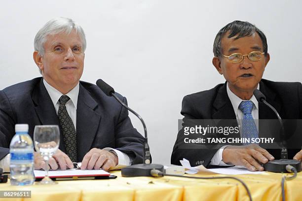 Michael J. O'Leary , representative of the World Health Organization , and Eng Huot , Cambodian secretary of the Ministry of Health attend a joint...