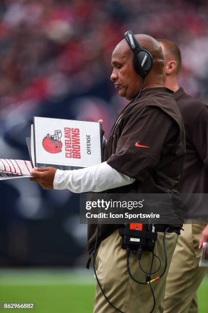 Cleveland Browns head coach Hue Jackson opens up his playbook during the football game between the Cleveland Browns and the Houston Texans on October...