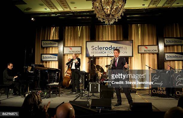 Musician Dave Koz with the Dick Bright Orchestra perform at The Scleroderma Research Foundation's "Cool Comedy - Hot Cuisine" at San Francisco Palace...