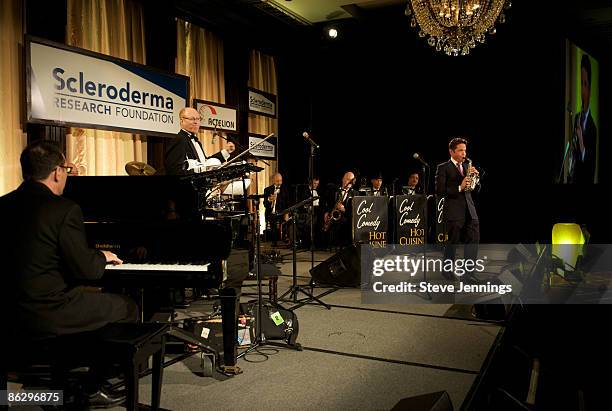 Musician Dave Koz with the Dick Bright Orchestra perform at The Scleroderma Research Foundation's "Cool Comedy - Hot Cuisine" at San Francisco Palace...