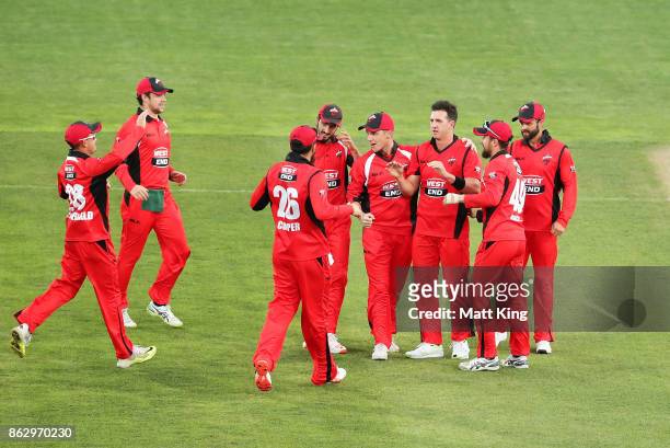 Daniel Worrall of the Redbacks celebrates with team mates after taking the first wicket of Aaron Finch of the Bushrangers during the JLT One Day Cup...