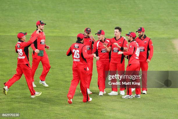 Daniel Worrall of the Redbacks celebrates with team mates after taking the first wicket of Aaron Finch of the Bushrangers during the JLT One Day Cup...