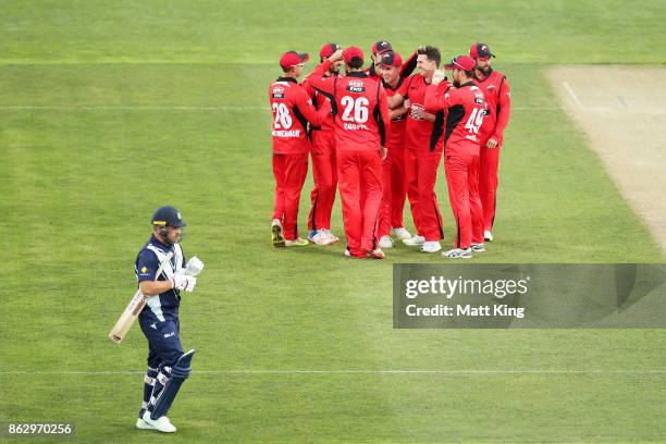 Daniel Worrall of the Redbacks celebrates with team mates after taking the first wicket of Aaron Finch of the Bushrangers during the JLT One Day Cup...