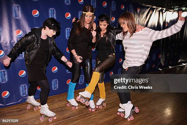 Kelly Osbourne, reality television personalities Khloe Kardashian, Kim Kardashian and an unidentified guest attend a party launching Pepsi Throwback...