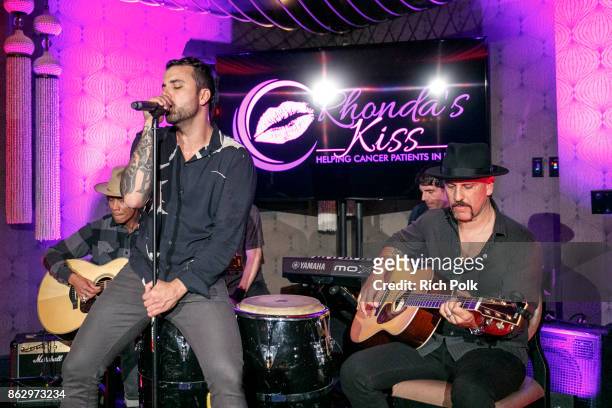 Franky Perez and Dave Kushner perform on stage with the Hellcat Saints at An Evening With Rhonda's Kiss Charity at Beauty & Essex on October 18, 2017...