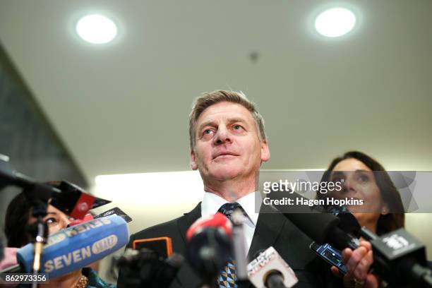 Outgoing Prime Minister Bill English speaks while wife Mary looks on during a National Party press conference at Parliament on October 19, 2017 in...