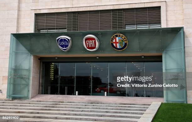 The symbols of Lancia, Fiat and Alfa Romeo are displayed on April 29, 2009 in Turin, Italy. Automakers Chrysler LLC and Fiat are in discussions for...