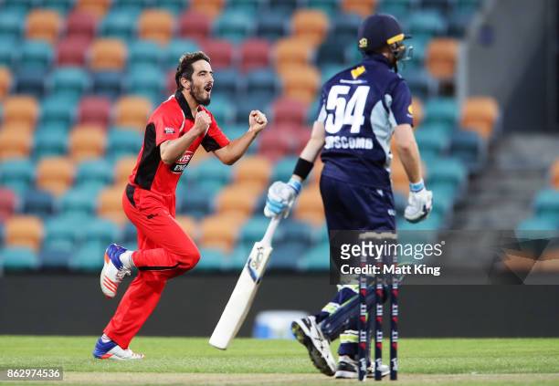 Cameron Valente of the Redbacks celebrates taking the wicket of Peter Handscomb of the Bushrangers during the JLT One Day Cup match between South...