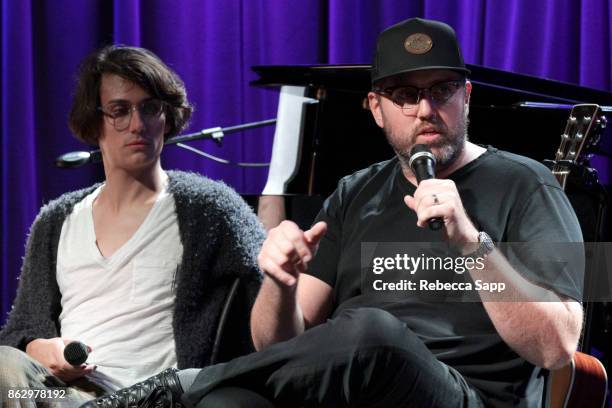 Teddy Geiger and busbee speak onstage at Chart Toppers: Songwriters/Producers In-The-Round Featuring Busbee, Dave Bassett, Warren "Oak" Felder, And...